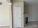 Carpeted living room with fireplace at 15200 Chowning Tavern Ln, Charlotte, NC 28262