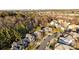 An elevated view of the neighborhood's streets, landscaping, and roof lines at 15323 Prescott Hill Ave, Charlotte, NC 28277