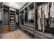 Custom closet with built-in shelving, drawers, and hanging rods at 16110 Foreleigh Rd, Huntersville, NC 28078