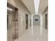 Hallway with elevator access and modern finishes throughout at 210 N Church St # 2409, Charlotte, NC 28202