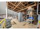 Unfinished attic storage space with exposed wood beams and ample room for storage at 223 Scottish Dr, Mooresville, NC 28115