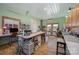 Spacious craft room with natural light, wooden floors, and plenty of counter space for creative projects at 223 Scottish Dr, Mooresville, NC 28115