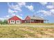 Charming red farmhouse with attached garage and covered porch at 223 Scottish Dr, Mooresville, NC 28115