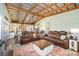 Spacious living room with modern decor, vaulted ceilings, and seamless flow to the kitchen at 223 Scottish Dr, Mooresville, NC 28115