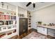 Office featuring custom shelving, cabinets, and a modern safe at 223 Scottish Dr, Mooresville, NC 28115