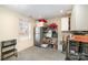 Functional storage area with a refrigerator, shelving, and overhead cabinets at 223 Scottish Dr, Mooresville, NC 28115