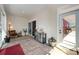 Bright sunroom with outdoor access, featuring an area rug and sitting area with natural light at 223 Scottish Dr, Mooresville, NC 28115
