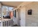 Cozy front porch of this beautiful home with an inviting entrance with view of the street at 2640 Olando St, Charlotte, NC 28206