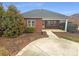 Well-maintained backyard with lush greenery and a patio area for entertaining at 2702 Occaneechi Ct, Waxhaw, NC 28173