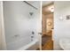 Bathroom featuring a bathtub/shower combination and access to hallway at 315 Wakefield Dr, Charlotte, NC 28209