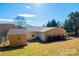 Expansive backyard featuring a storage shed and ample space for outdoor activities at 3415 23Rd Ne St, Hickory, NC 28601