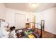 Bedroom featuring a metal frame bed, wood-look floors and a bright window at 3415 23Rd Ne St, Hickory, NC 28601