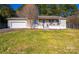 Charming single-story home featuring a front porch, attached garage, and a well-maintained lawn at 3415 23Rd Ne St, Hickory, NC 28601