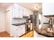 Modern kitchen with stainless steel appliances, ample cabinetry, and decorative wallpaper accents at 3415 23Rd Ne St, Hickory, NC 28601