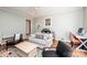 Comfortable living room with hardwood floors, light blue walls, and a ceiling fan at 3415 23Rd Ne St, Hickory, NC 28601