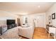 Inviting living room with hardwood floors, neutral decor, and ample natural light at 3415 23Rd Ne St, Hickory, NC 28601