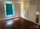 Bright bedroom with hardwood floors, a large window, and a neutral color palette at 441 Hope St, Rock Hill, SC 29730