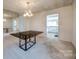 The formal dining room features a chandelier, mirrors and space for entertaining at 4500 Town And Country Dr # 18, Charlotte, NC 28226