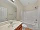 Bright bathroom with a combination tub and shower, along with a spacious vanity area at 5002 Fine Robe Dr, Indian Trail, NC 28079