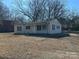 Charming single-story home featuring a well-kept front yard with traditional design elements at 502 E Maine Ave, Bessemer City, NC 28016