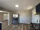 Bright kitchen with modern appliances, ample cabinet space, and stylish wood-look flooring at 502 E Maine Ave, Bessemer City, NC 28016
