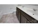 Bathroom featuring double sink vanity, white countertop and tile flooring at 6148 Durango Way, Denver, NC 28037