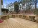Wooden back deck overlooking a backyard with trees at 621 Ravenglass Dr, Fort Mill, SC 29715