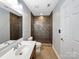 Bathroom features a step in shower with decorative tiles, sink with vanity, and toilet at 621 Ravenglass Dr, Fort Mill, SC 29715