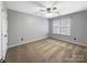 Bedroom with neutral carpet, window, and ceiling fan at 621 Ravenglass Dr, Fort Mill, SC 29715