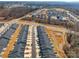 Panoramic aerial view of a meticulously planned community with townhomes and a pool at 6278 Ashton Park Dr, Denver, NC 28037