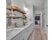 Bathroom features double sinks, quartz countertops, floating wood shelves, and a walk-in closet at 6278 Ashton Park Dr, Denver, NC 28037
