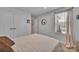 Bedroom featuring neutral tones, modern fixtures, and ample natural light at 6278 Ashton Park Dr, Denver, NC 28037