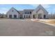 Well-maintained, modern clubhouse exterior with ample parking and accessible entrance at 6278 Ashton Park Dr, Denver, NC 28037