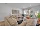 Bright and airy living room with comfortable seating, modern decor, and ample natural light at 6278 Ashton Park Dr, Denver, NC 28037