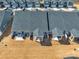 Aerial view of townhome exteriors with covered patios and a small fenced yard at 6278 Ashton Park Dr, Denver, NC 28037