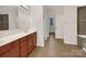 Bathroom featuring ample countertop space and a shower-tub combo at 705 Old Cove Rd, Tega Cay, SC 29708