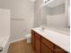 Clean bathroom with modern vanity, tiled floor, and tub and shower at 705 Old Cove Rd, Tega Cay, SC 29708