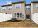 Townhome backyard with privacy fence, patio, and air conditioning unit at 8619 Harris Lake Ln, Charlotte, NC 28269