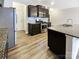 Bright kitchen with modern appliances, granite countertops and an island with a sink at 8619 Harris Lake Ln, Charlotte, NC 28269