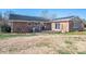 Spacious backyard with brick patio, grill, and room to enjoy outdoor activities at 9026 Longview Dr, Charlotte, NC 28214