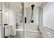 Sleek bathroom showcasing a spacious walk-in shower with marble tiling and modern fixtures at 108 Pebble Creek Xing, Fort Mill, SC 29715