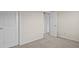 Neutral bedroom featuring carpeting and a door to the hallway at 11142 Jc Murray Nw Dr, Concord, NC 28027