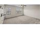 Bright bedroom with large windows and neutral carpet, providing natural light at 11142 Jc Murray Nw Dr, Concord, NC 28027