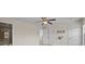 Bedroom featuring ceiling fan, closet, and ensuite bathroom at 11142 Jc Murray Nw Dr, Concord, NC 28027