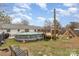 Backyard of home with above ground pool and play area at 127 Wright Cir, Cherryville, NC 28021