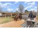 Picturesque backyard with a deck, play area, mature tree, and stylish outdoor seating at 127 Wright Cir, Cherryville, NC 28021