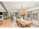Open-concept dining area with chandelier, seamlessly connected to the kitchen at 127 Wright Cir, Cherryville, NC 28021