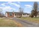 Charming single-story home with a well-manicured lawn and a welcoming entrance at 127 Wright Cir, Cherryville, NC 28021