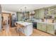 Well-lit kitchen features a center island, modern appliances, and stylish fixtures at 127 Wright Cir, Cherryville, NC 28021