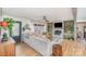 Bright and cozy living room featuring a fireplace, built-in shelving, and modern furnishings at 127 Wright Cir, Cherryville, NC 28021